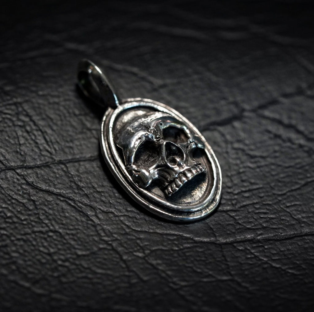 Oval Framed Skull Pendant