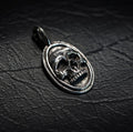 Oval Framed Skull Pendant