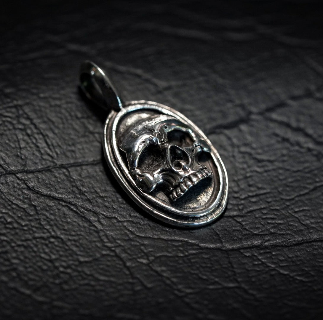 Oval Framed Skull Pendant