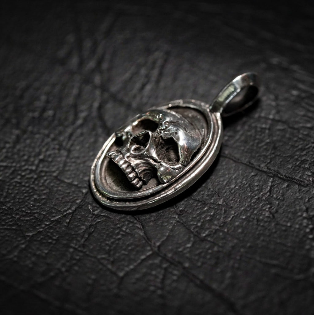 Oval Framed Skull Pendant