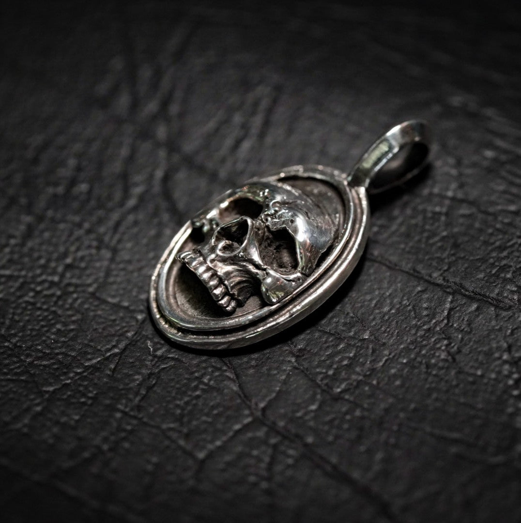 Oval Framed Skull Pendant