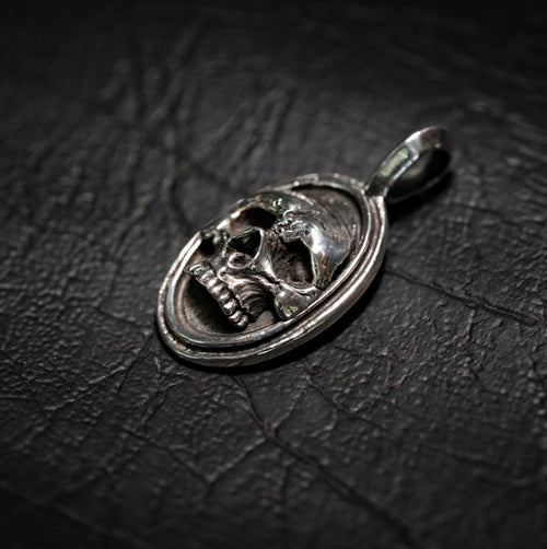 Oval Framed Skull Pendant